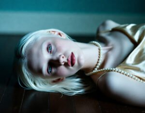 Albino Model in Teal Wall Portrait