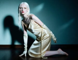 Albino Model in Teal Wall Portrait